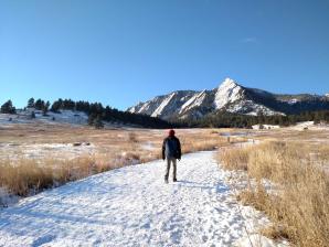 Winter hiker at Chautauqua Park Winter hiker on a trail at Chautauqua Park