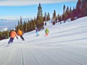 Downhill skiing in Snowmass, Colorado People downhill skiing in Snowmass, Colorado