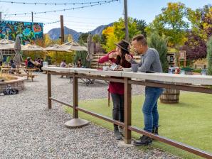 The Rayback Collective food park in Boulder A man and woman eat tacos outside at The Rayback Collective food park in Boulder